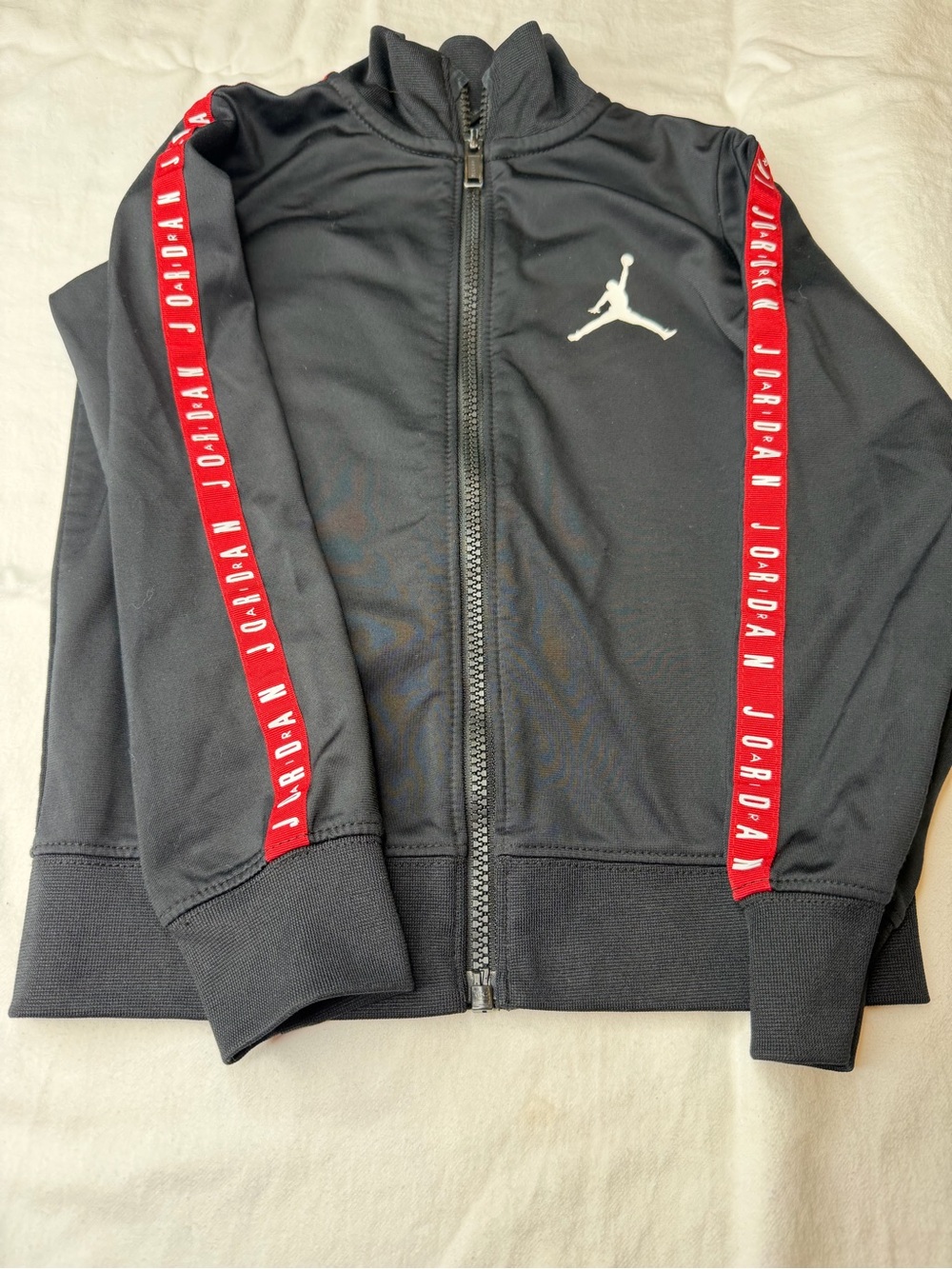 Jordan Black Track Jacket with Red Sleeve Stripes and White Jumpman